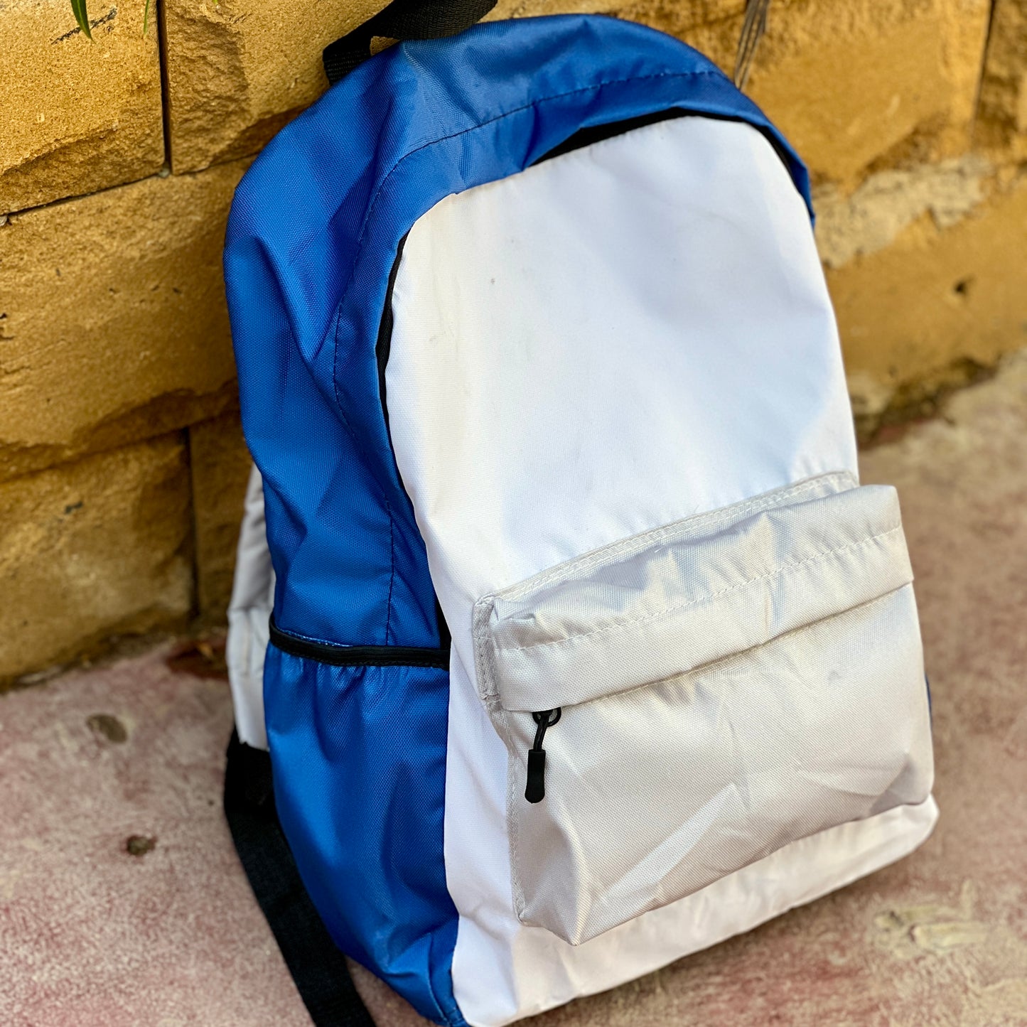 DB048 Colorful Contrast Allover Printed Backpack
