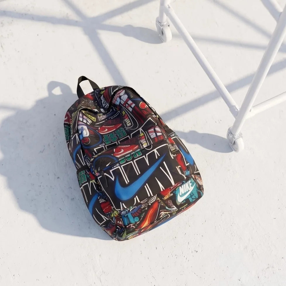DB009 Just Do It Allover Printed Backpack