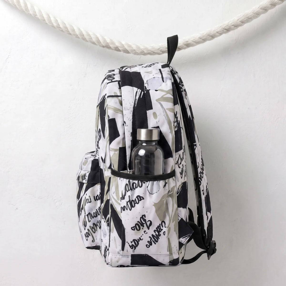 DB088 Typography Art Allover Printed Backpack - BREACHIT