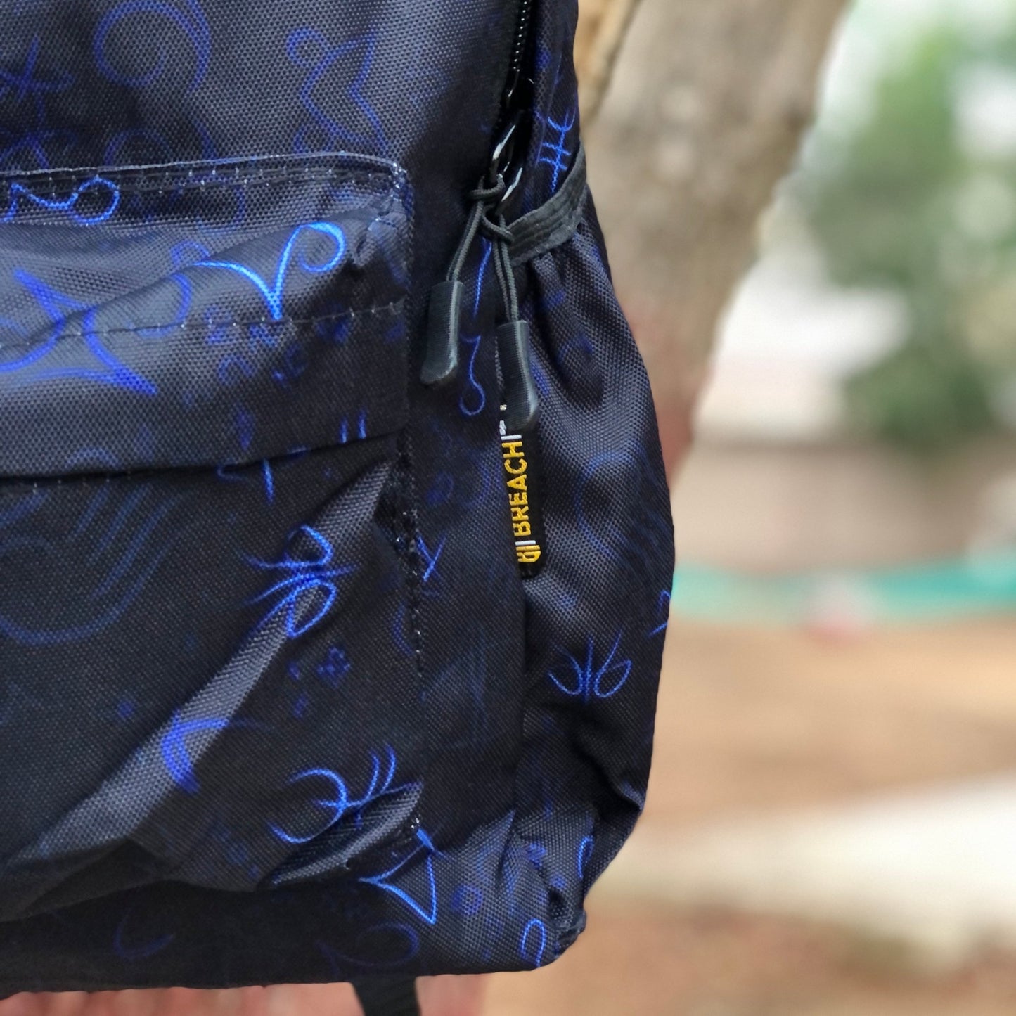 DB119 Black Magic Allover Printed Backpack - BREACHIT